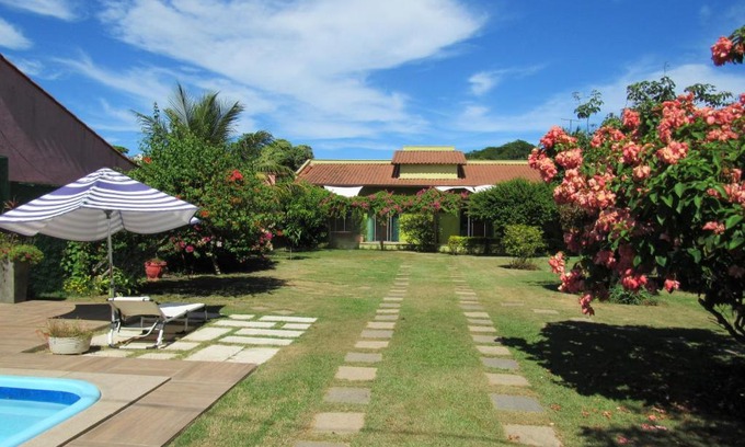 Manguinhos Hotel | Experience Comfort at Pousada Mangas - Pet-Friendly Oasis