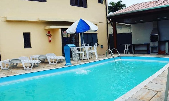 Caraguatatuba Hotel | Beachside Retreat: Pousada Marambaia with Pool & Ocean View