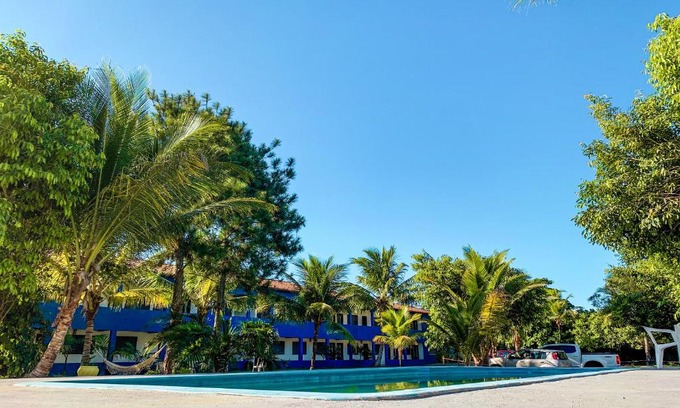 Porto Seguro Hotel | Pet-Friendly Pousada Migo: Poolside Bliss with Ocean Views