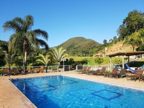 Aguas de Lindoia Hotel | Inviting Pousada Nefelibatas: Pool, Hot Tub & Family Friendly
