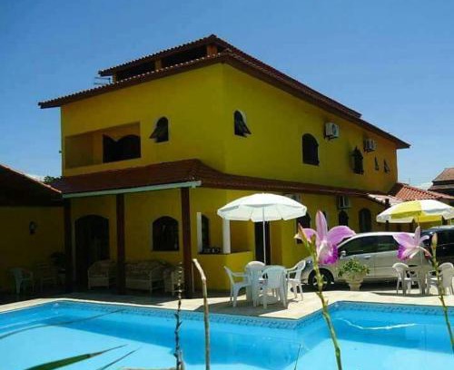 Peruibe Hotel | Oceanfront Pousada Peruíbe Praia with Pool & Spa Access