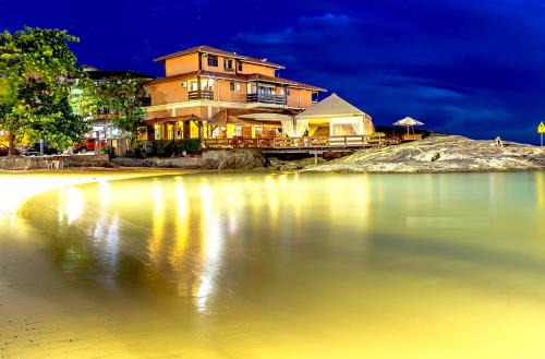 Iriri Hotel | Oceanfront Bliss at Pousada Recanto da Pedra – Rated 9.3