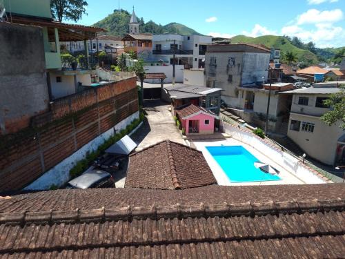 Santa Rita de Jacutinga Hotel | Welcoming Pousada Santa Clara: Pool, Pet-Friendly & More