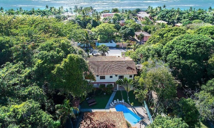 Arraial d'Ajuda Hotel | Discover Pousada Terra Coral: Pool, Breakfast & Family-Friendly
