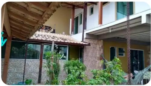 Rio das Ostras House | Indulge in Tia Rosi: Oceanfront Suite Near the Beach