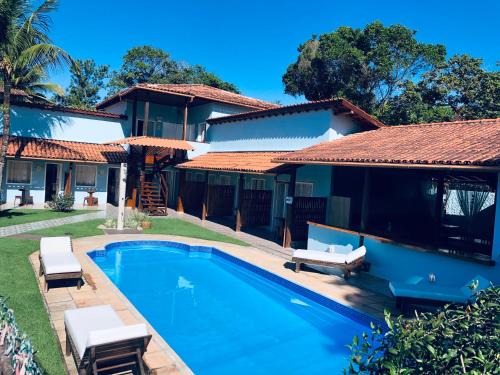 Arraial d'Ajuda Hotel | Discover Pousada Universo: Oceanfront Getaway with Pool