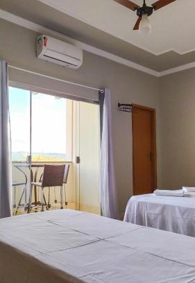 Sao Joao Batista do Gloria House | Discover Pouso Oliveira Suítes: 10/10 Guest Rated Escape