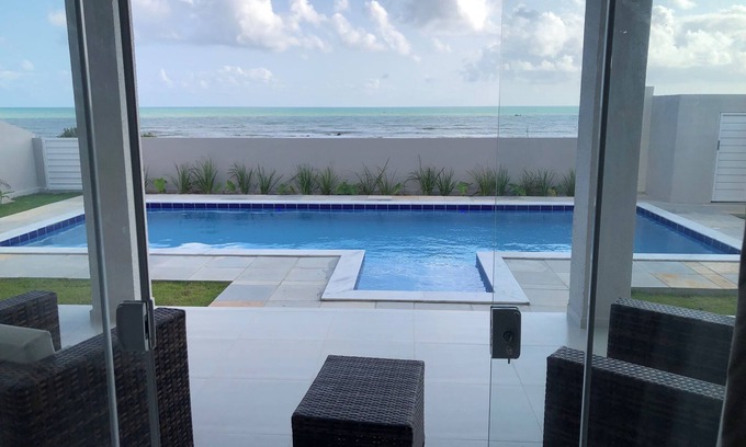Touros Villa | Beachfront Retreat with Pool and Pet-Friendly Amenities
