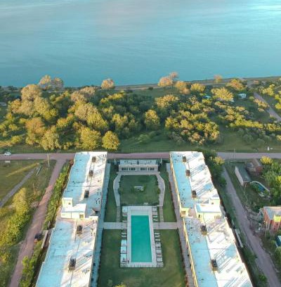 Villa Rumipal Apartment | Discover Prado del Lago: Pet-Friendly Oasis with Pool