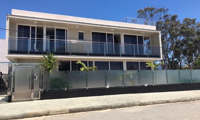 Palhoca House | Elegant Oceanfront Retreat with 5 Bedrooms near the Beach