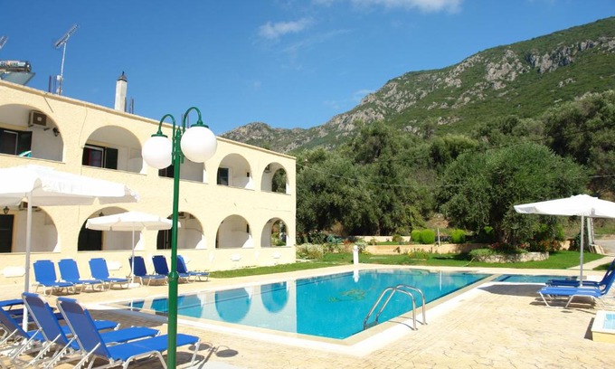 Agios Matthaios Apartment | Discover Prasoudopetra: Family-Friendly with Pool & Hot Tub