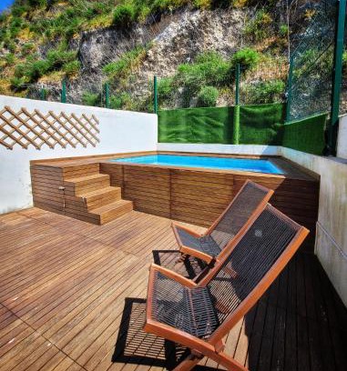 Lisbon Apartment | Relaxing Stay at Prazeres Pool Residence with Inviting Amenities