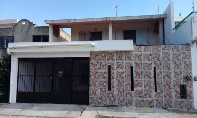 Zona Industrial House | Charming Retreat in Exclusive Neighborhood with Kitchen Access