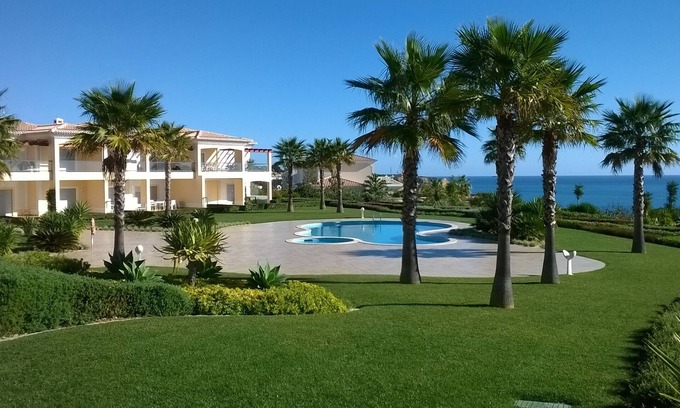 Porto de Mos Apartment | Oceanfront 5-Star Apartment Near Porto de Mos Beach