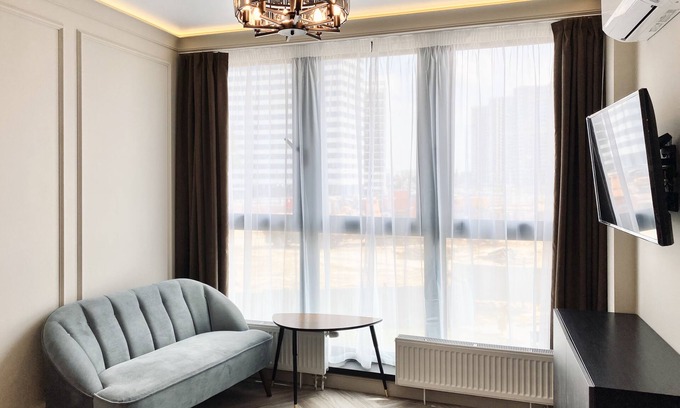 Oktyabrsky District Apartment | Elegant Studio in the Premier "Minsk World" Complex