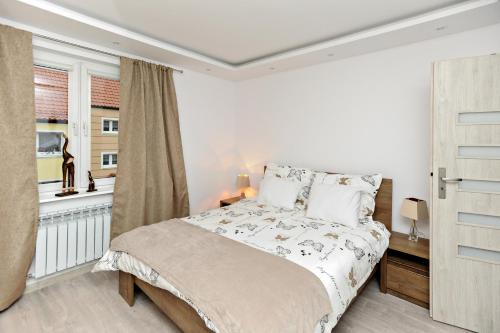 Elblag Apartment | Prestige Apartment: Top-Rated Stay with Pet-Friendly Perks