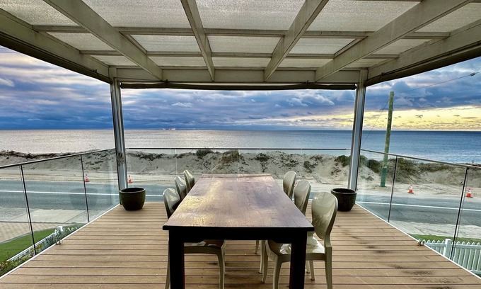 Halls Head Villa | Prime Beachfront Hotel with Ocean Views & Family Amenities