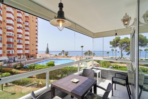 Torrox Costa Apartment | Oceanfront Paradise with Terrace and Pool at A104