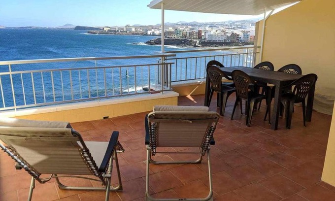 Melenara Apartment | Prime Location with Expansive Terrace and Family Amenities