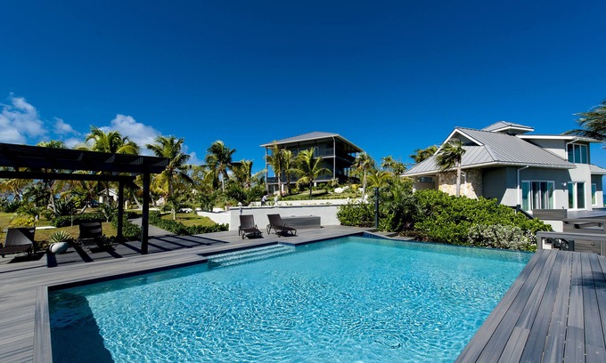 North Palmetto Point House | Breathtaking Beachfront Estate with Pool and Tennis Court