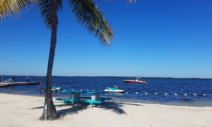 Key Largo Village House | Seaside Retreat: Beachfront Bliss and Family-Friendly Fun