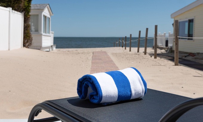 Clinton House | Oceanview Castle Retreat: Private Beach & Pet-Friendly Comfort