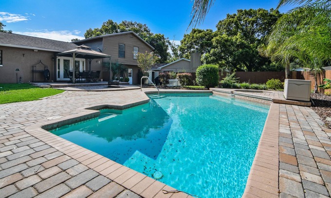 Greater Northdale House | Inviting Private Home with Pool & Game Room Retreat