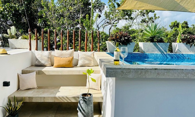 Ek Balam Village House | Relaxing Retreat with Private Rooftop Pool & Ocean Views