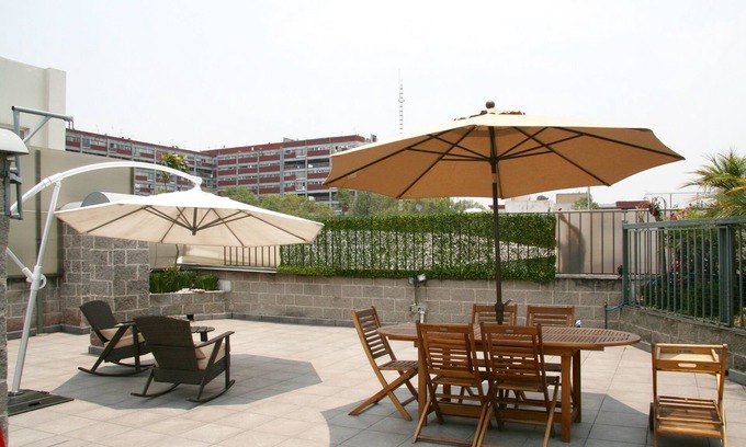 Del Valle Apartment | Exclusive Rooftop Apartment Retreat for Unforgettable Stays