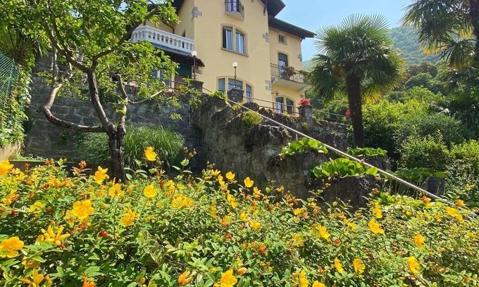 Perledo Villa | Cozy Villa Room with Terrace and Serene Garden Views