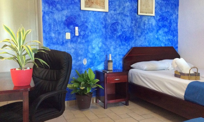 Chetumal Bed & Breakfast | Cozy Room Steps from UQROO and Convention Center