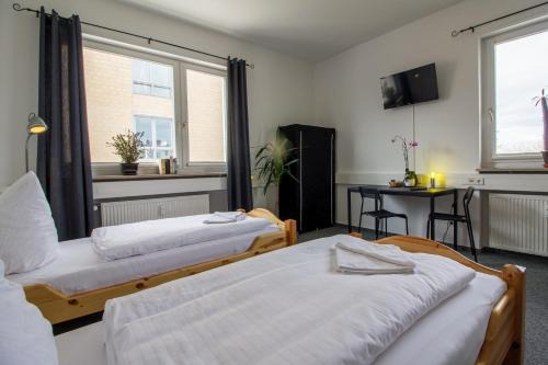 Karlsruhe City Centre House | Guest Rated Hotel Rooms with Family Amenities and Dining