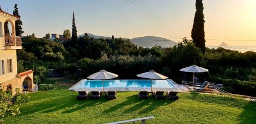 Troezen House | Indulge in a Private Cottage with Pool & Ocean Views