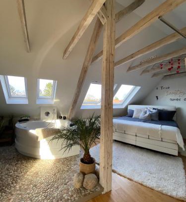 Burgaltendorf Apartment | Indulgent Wellness Suites with Private Whirlpool Retreat