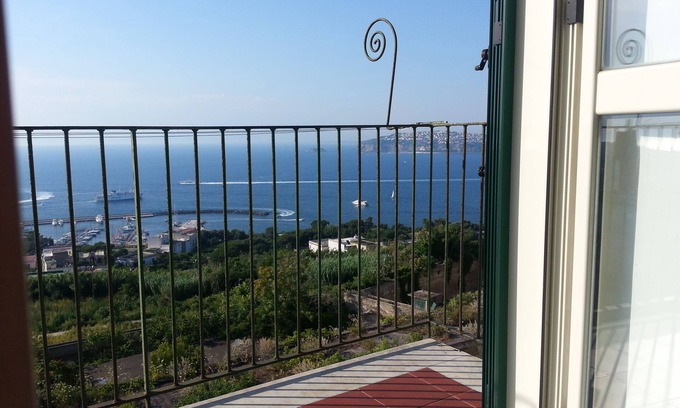 Terra Murata Apartment | Stylish Procida House with Ocean View & Pool Amenities