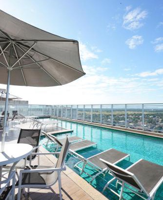 Centro Hotel | Relax at Promenade Fusion Itaguaí with Oceanfront Views