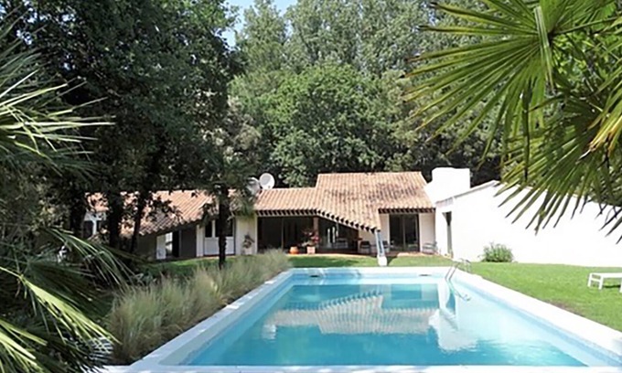 Saint-Hilaire-de-Riez Villa | Architectural Forest Retreat with Pool and Ocean View