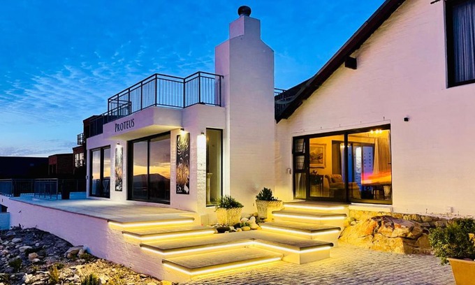Rooiels Villa | Beachfront Bliss at Proteus Beach House - Pet Friendly & Pool