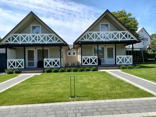 Ostrowo House | Experience Przystań Jagoda: Oceanfront Rooms & Cabins