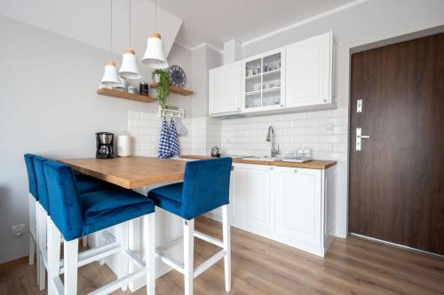Darlowko Apartment | Cozy Apartment II: Family-Friendly with Pool Access