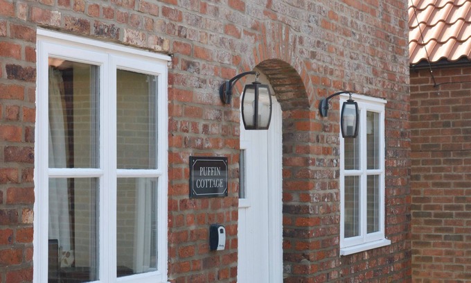 Buckton Cottage | Experience Puffin Cottage: Converted Hay Barn with Ocean Views