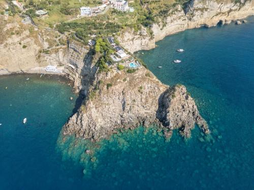 Succhivo Hotel | Punta Chiarito Resort: Oceanfront Haven with Spa & Pool