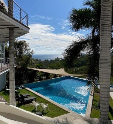 Santa Maria Huatulco Apartment | Experience Punta Gaviota: Family-Friendly with Pool & Breakfast