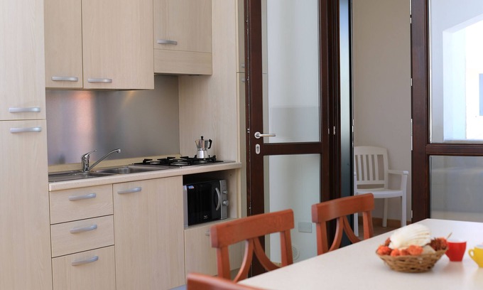 Porto Cesareo Apartment | Punta Grossa Village: Family-Friendly Stay with Pool & Spa
