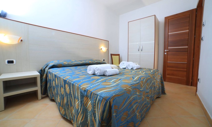 Porto Cesareo Apartment | Punta Grossa Village: Family-Friendly Three-Room Retreat