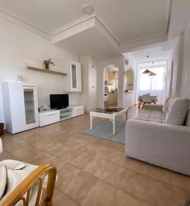 Punta Prima Apartment | Punta Prima Getaway: Family-Friendly Oceanfront Retreat