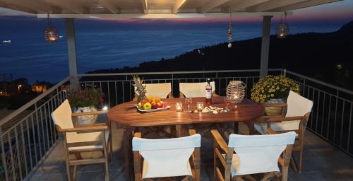 Athani Apartment | Experience Pure Blue: Oceanfront Retreat with Hot Tub