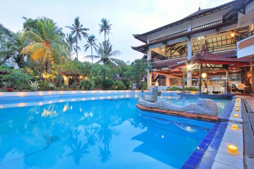 Legian Hotel | Beachfront Bliss at Puri Naga Cottages with Pool & Ocean Views