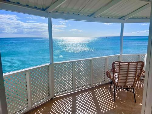 Little Battaleys Villa | Beachfront Bliss at Purple Rain - 4-Star Holiday Home