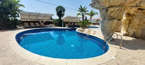 Pyla Apartment | Relax at Pyla Palms Resort with Oceanfront Pool Access